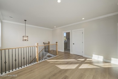 Introducing The Emmy - what a perfect name for a luxury on Brunswick Plantation and Golf Resorts in North Carolina - for sale on GolfHomes.com, golf home, golf lot