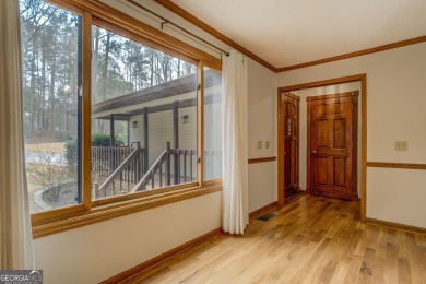 Welcome to this beautifully renovated lakefront home located in on Turtle Cove Golf Course in Georgia - for sale on GolfHomes.com, golf home, golf lot