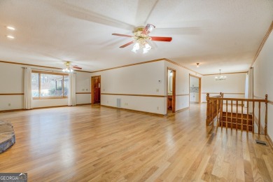 Welcome to this beautifully renovated lakefront home located in on Turtle Cove Golf Course in Georgia - for sale on GolfHomes.com, golf home, golf lot