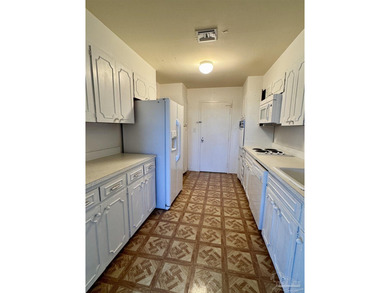 Two bedroom, two bath flat at the iconic Bayshore Condominium on Pensacola Country Club in Florida - for sale on GolfHomes.com, golf home, golf lot