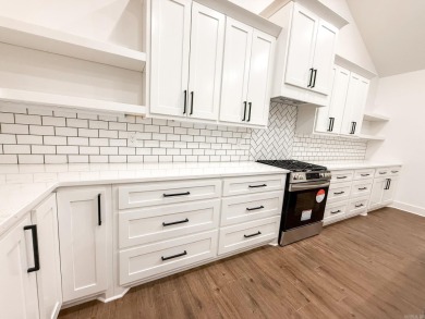 Brand new construction across the street from Granada Golf on Isabella Golf Course  in Arkansas - for sale on GolfHomes.com, golf home, golf lot