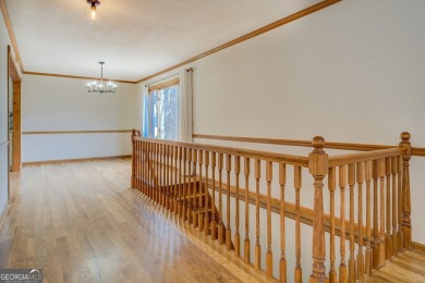 Welcome to this beautifully renovated lakefront home located in on Turtle Cove Golf Course in Georgia - for sale on GolfHomes.com, golf home, golf lot