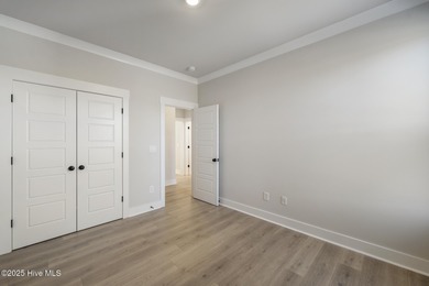 Introducing The Emmy - what a perfect name for a luxury on Brunswick Plantation and Golf Resorts in North Carolina - for sale on GolfHomes.com, golf home, golf lot