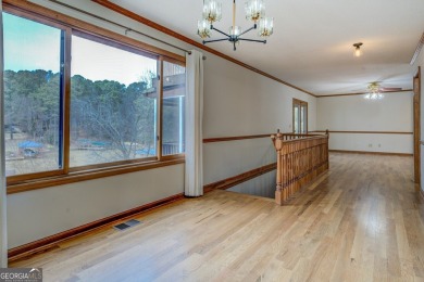 Welcome to this beautifully renovated lakefront home located in on Turtle Cove Golf Course in Georgia - for sale on GolfHomes.com, golf home, golf lot