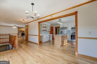 Welcome to this beautifully renovated lakefront home located in on Turtle Cove Golf Course in Georgia - for sale on GolfHomes.com, golf home, golf lot
