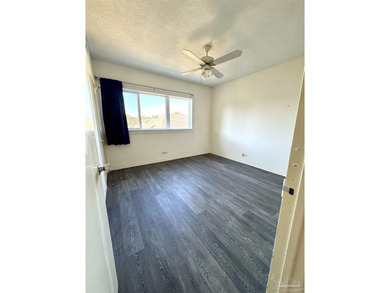 Two bedroom, two bath flat at the iconic Bayshore Condominium on Pensacola Country Club in Florida - for sale on GolfHomes.com, golf home, golf lot