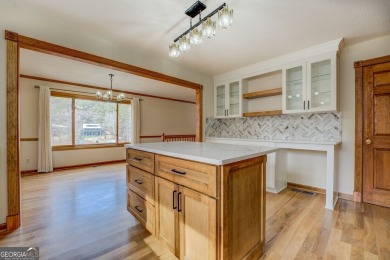 Welcome to this beautifully renovated lakefront home located in on Turtle Cove Golf Course in Georgia - for sale on GolfHomes.com, golf home, golf lot