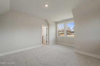 Introducing The Emmy - what a perfect name for a luxury on Brunswick Plantation and Golf Resorts in North Carolina - for sale on GolfHomes.com, golf home, golf lot