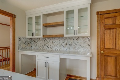 Welcome to this beautifully renovated lakefront home located in on Turtle Cove Golf Course in Georgia - for sale on GolfHomes.com, golf home, golf lot