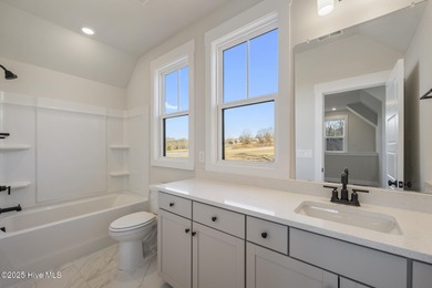 Introducing The Emmy - what a perfect name for a luxury on Brunswick Plantation and Golf Resorts in North Carolina - for sale on GolfHomes.com, golf home, golf lot