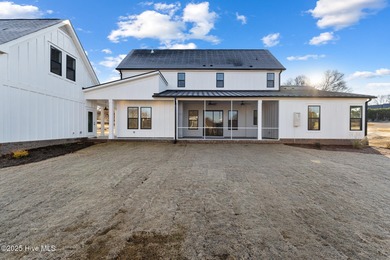 Introducing The Emmy - what a perfect name for a luxury on Brunswick Plantation and Golf Resorts in North Carolina - for sale on GolfHomes.com, golf home, golf lot