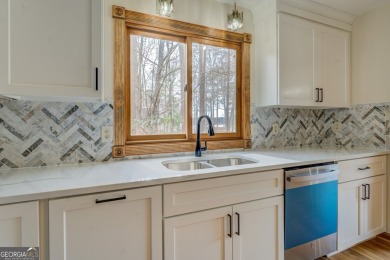 Welcome to this beautifully renovated lakefront home located in on Turtle Cove Golf Course in Georgia - for sale on GolfHomes.com, golf home, golf lot