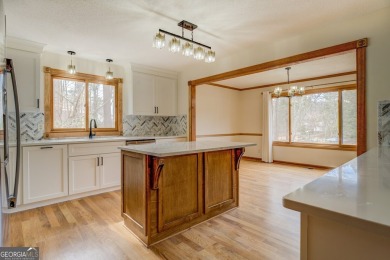 Welcome to this beautifully renovated lakefront home located in on Turtle Cove Golf Course in Georgia - for sale on GolfHomes.com, golf home, golf lot