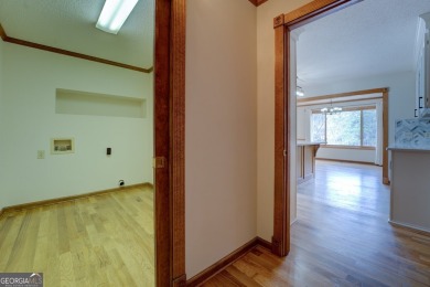 Welcome to this beautifully renovated lakefront home located in on Turtle Cove Golf Course in Georgia - for sale on GolfHomes.com, golf home, golf lot