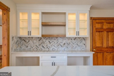 Welcome to this beautifully renovated lakefront home located in on Turtle Cove Golf Course in Georgia - for sale on GolfHomes.com, golf home, golf lot