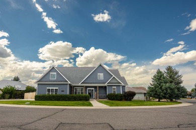 This stunning residence in the sought-after Cobble Creek Golf on Links At Cobble Creek in Colorado - for sale on GolfHomes.com, golf home, golf lot