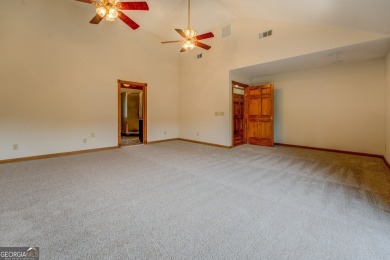 Welcome to this beautifully renovated lakefront home located in on Turtle Cove Golf Course in Georgia - for sale on GolfHomes.com, golf home, golf lot