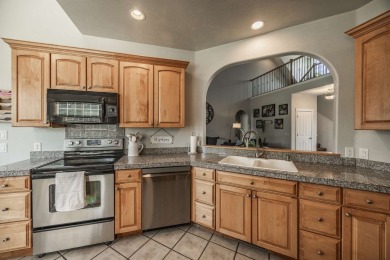 This stunning residence in the sought-after Cobble Creek Golf on Links At Cobble Creek in Colorado - for sale on GolfHomes.com, golf home, golf lot