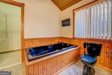 Welcome to this beautifully renovated lakefront home located in on Turtle Cove Golf Course in Georgia - for sale on GolfHomes.com, golf home, golf lot