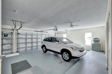 Gorgeous executive one level home on desirable oversized corner on Atlantis Golf Club in Florida - for sale on GolfHomes.com, golf home, golf lot