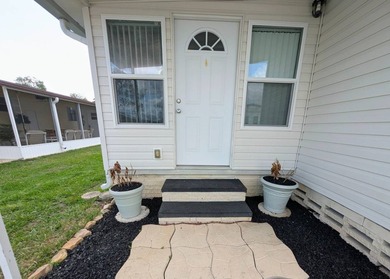 Move-in ready and fully furnished, this beautifully maintained on Grasslands Golf and Country Club in Florida - for sale on GolfHomes.com, golf home, golf lot