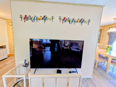 Move-in ready and fully furnished, this beautifully maintained on Grasslands Golf and Country Club in Florida - for sale on GolfHomes.com, golf home, golf lot