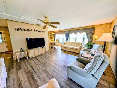 Move-in ready and fully furnished, this beautifully maintained on Grasslands Golf and Country Club in Florida - for sale on GolfHomes.com, golf home, golf lot