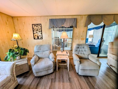 Move-in ready and fully furnished, this beautifully maintained on Grasslands Golf and Country Club in Florida - for sale on GolfHomes.com, golf home, golf lot