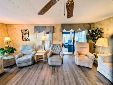 Move-in ready and fully furnished, this beautifully maintained on Grasslands Golf and Country Club in Florida - for sale on GolfHomes.com, golf home, golf lot