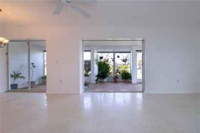 One or more photo(s) has been virtually staged. BIG PRICE DROP on Village Green Golf Club of Sarasota in Florida - for sale on GolfHomes.com, golf home, golf lot