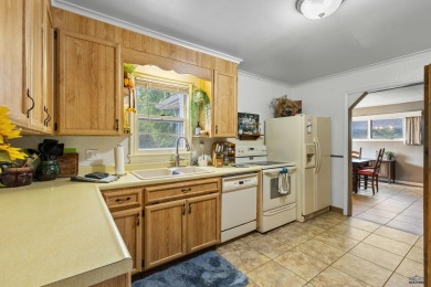Charming West Side Home - Prime Location!  Enjoy main-level on Meadowbrook Golf Course in South Dakota - for sale on GolfHomes.com, golf home, golf lot