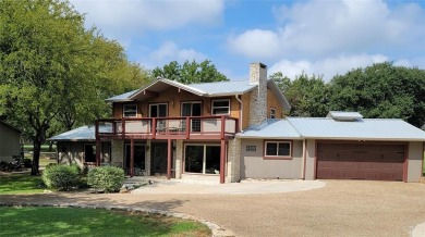 Welcome Home to Golf Course Views. Gather, Mingle, and Entertain on De Cordova Bend Country Club in Texas - for sale on GolfHomes.com, golf home, golf lot