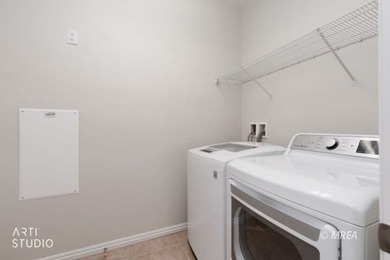 Beautifully designed 2-bedroom home plus den featuring a on Conestoga Golf Club in Nevada - for sale on GolfHomes.com, golf home, golf lot