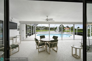 This home boasts the most magnificent view in Boca Greens! The on Boca Greens Country Club in Florida - for sale on GolfHomes.com, golf home, golf lot