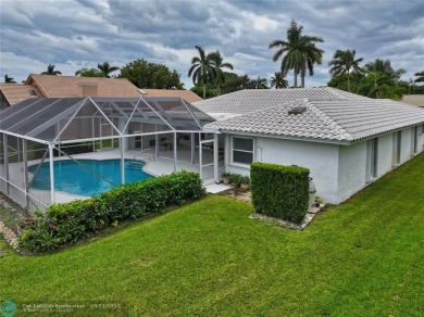 This home boasts the most magnificent view in Boca Greens! The on Boca Greens Country Club in Florida - for sale on GolfHomes.com, golf home, golf lot