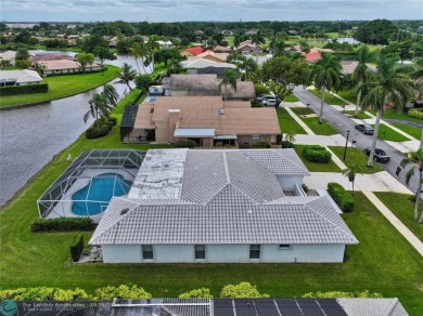 This home boasts the most magnificent view in Boca Greens! The on Boca Greens Country Club in Florida - for sale on GolfHomes.com, golf home, golf lot