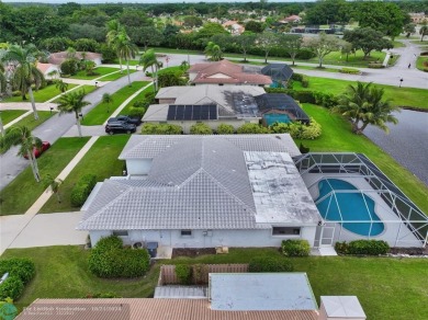 This home boasts the most magnificent view in Boca Greens! The on Boca Greens Country Club in Florida - for sale on GolfHomes.com, golf home, golf lot