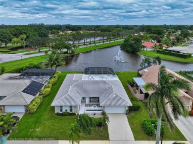 This home boasts the most magnificent view in Boca Greens! The on Boca Greens Country Club in Florida - for sale on GolfHomes.com, golf home, golf lot