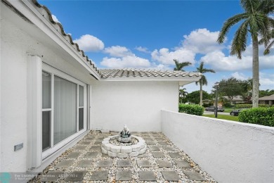 This home boasts the most magnificent view in Boca Greens! The on Boca Greens Country Club in Florida - for sale on GolfHomes.com, golf home, golf lot