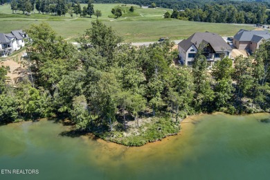 Discover the perfect lakefront retreat with this stunning on Wind River Golf Course in Tennessee - for sale on GolfHomes.com, golf home, golf lot