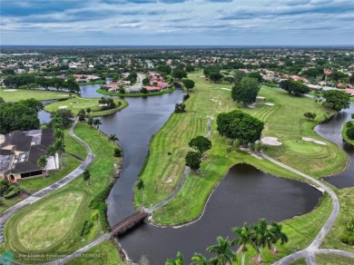 This home boasts the most magnificent view in Boca Greens! The on Boca Greens Country Club in Florida - for sale on GolfHomes.com, golf home, golf lot