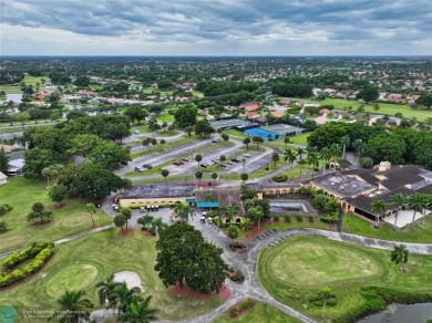 This home boasts the most magnificent view in Boca Greens! The on Boca Greens Country Club in Florida - for sale on GolfHomes.com, golf home, golf lot