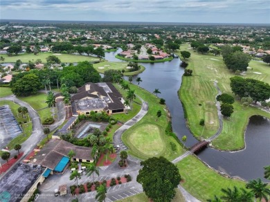 This home boasts the most magnificent view in Boca Greens! The on Boca Greens Country Club in Florida - for sale on GolfHomes.com, golf home, golf lot