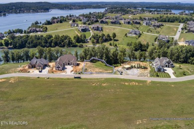 Discover the perfect lakefront retreat with this stunning on Wind River Golf Course in Tennessee - for sale on GolfHomes.com, golf home, golf lot