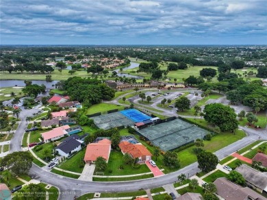 This home boasts the most magnificent view in Boca Greens! The on Boca Greens Country Club in Florida - for sale on GolfHomes.com, golf home, golf lot