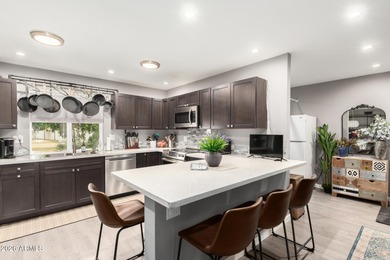 Enjoy easy living in this charming 2-bedroom Gemini home with a on Sun City Country Club in Arizona - for sale on GolfHomes.com, golf home, golf lot