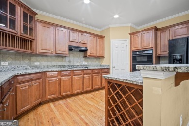 TERRIFIC OPPORTUNITY FOR SAVVY BUYERS IN WOODMONT GOLF AND on Woodmont Golf and Country Club in Georgia - for sale on GolfHomes.com, golf home, golf lot