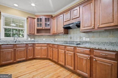 TERRIFIC OPPORTUNITY FOR SAVVY BUYERS IN WOODMONT GOLF AND on Woodmont Golf and Country Club in Georgia - for sale on GolfHomes.com, golf home, golf lot