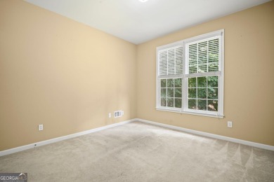 TERRIFIC OPPORTUNITY FOR SAVVY BUYERS IN WOODMONT GOLF AND on Woodmont Golf and Country Club in Georgia - for sale on GolfHomes.com, golf home, golf lot
