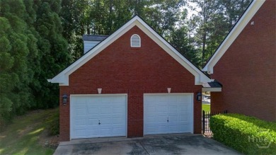 Welcome to this stunning all-brick ranch nestled in a desirable on Monroe Golf and Country Club in Georgia - for sale on GolfHomes.com, golf home, golf lot